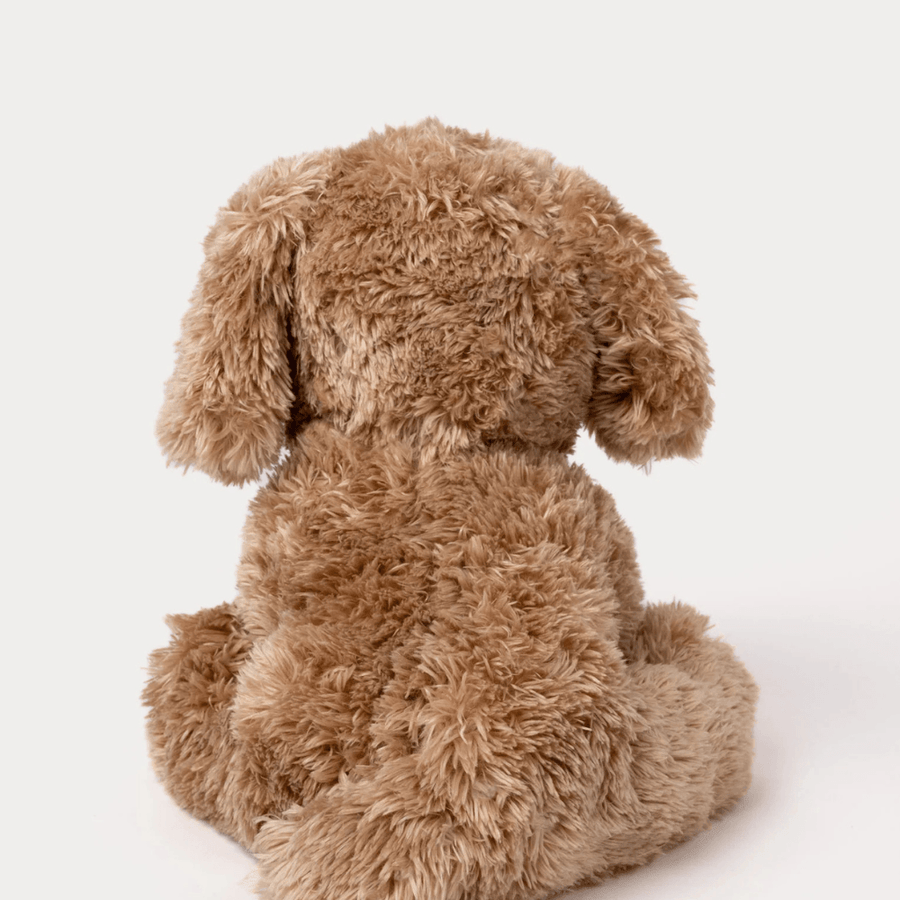 Teddykompaniet Selma Hundekosedyr – nærbilde av ansikt med store øyne og bred munn